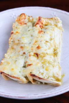 Salsa Verde Chicken Enchiladas. SO good and so easy! Just 4 ingredients. Make with corn tortillas instead of flour for gluten free!