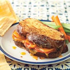 This cheddar and tomato stuffed french toast is the perfect combination of french toast and a grilled cheese sandwich,