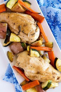 Garden Vegetable Roasted Chicken ~ A garden vegetable inspired roasted chicken dish. A simple weeknight meal with fresh, summery flavors. For a more flavorful dish, replace chicken breasts with boneless chicken thigh. Recipe from dineanddish.net