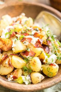 
                    
                        WARM POTATO SALAD WITH CREAMY GOAT CHEESE AND CRISPY BACON
                    
                