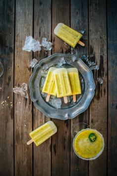 Pineapple Margarita Ice Pops PINEAPPLE MARGARITA ICE POPS RECIPE Makes 5 Ingredients: 3 cups freshly chopped pineapple zest of half a lime 1/4 cup fresh lime juice 2 pinches sea salt 2 tsp caster sugar 2 tbsp freshly chopped mint 1/3 cup Tequila 2 tbsp Cointreau Instructions: Blend all the ingredients in a blender or food processor until well combined. Pour the mixture into the ice pop moulds and place in the freezer for 2 hours. When the mixture is semi set pierce an ice cream stick through the