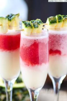 Strawberry "Lava Flow" Pina Colada - Creamy, sweet coconut cream pineapple banana Pina Colada with strawberry coconut rum poured into the bottom of the glass. This cocktail is named “Lava Flow” because the strawberry rum rises to the top of the coconut cream, leaving a lava like appearance. #ThePerfectMix #sponsored
