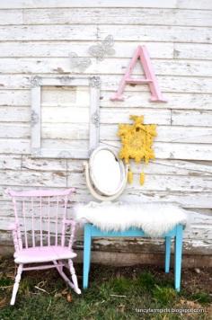 We sprayed the piano bench with Rustoleum “aqua”. Then we added some faux fur to give it some fun pep. The child’s rocker is sprayed Valspar’s “Rosy cheeks”.