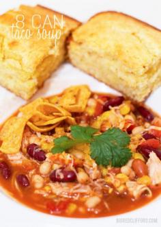 Easiest Taco Soup Recipe: 8 cans in  a crockpot + shredded chicken. Blend chili with 1 can chicken broth. Serve with sour cream and shredded cheese. Low for 5 hours.