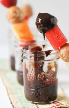 This Breakfast Fondue is so fun! Use donut holes, fresh fruit, and more.