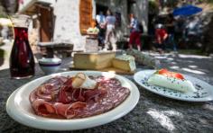
                    
                        The Grotto Pozzasc, famous for its polenta dishes, is the perfect spot to eat before or after a visit to Botta's chapel in Mogno.
                    
                