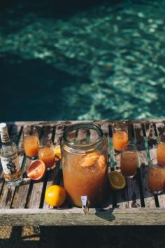 yes summer at the water's edge. Take a bite of Summer. Shark Punch Coconut cocktail.