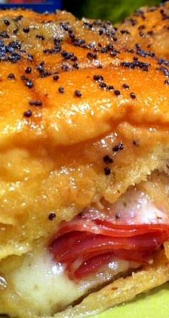 
                        
                            “Funeral Sandwiches” ~ The recipe calls for brown sugar and King’s Hawaiian Rolls... Double Yum! This would be a perfect dish for tailgating or entertaining.
                        
                    