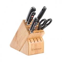 Cutlery Sets - The Classic line features cutlery that is precision forged of high-carbon, stain-resistant steel and skillfully honed by hand. The black, virtually indestructible, full tang handle is triple-riveted for superior strength and durability. Since 1814, knives bearing the Wusthof name and the Trident logo have been crafted in the world's "Cutlery Capital" of Solingen, Germany. Today, in a state-of-the-art facility, that tradition of quality is ensured as old-world craftsmanship meets 21st century production methods. Set includes: 3 1/2" paring knife 6" utility knife 8" chef's knife 8" bread knife 9" sharpening steel kitchen shears 13-slot hardwood block Product Features Precision forged from one-piece of steel for greater stability and sharpness Precision hand-honed, high-carbon, stainless-steel knife resists rust and stains Computer-controlled grinding and polishing yields precise tapering of blade Laser-controlled blade edges stay sharp lo - Care and Use Wusthof cutlery is dishwasher-safe, but hand-washing is recommended. In the dishwasher, your Wusthof knife may bang against other cutlery or pots and pans and knick the blade. Clean knife with a wet cloth and dishwashing detergent. Dry immediately. Dry from the back of knife to the blade. No metal is completely stain-free. To prevent slight tarnishing, be sure to remove acidic foods (lemon, mustard, ketchup, etc.) from the blade after use. If blade should show some signs of staining, clean with a non-abrasive metal polish. To prevent irreparable blade damage, it is best to store your knife in a knife block or in-drawer knife tray.