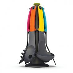 The Elevate collection of kitchen tools is designed to improve hygiene and minimize the mess made by placing utensils onto kitchen surfaces during use. Each tool has an innovative weighted handle with an integrated tool rest, ensuring that, when an Elevate utensil is placed down, its head is always raised off of the work surface. Perfect for use with non-stick cookware, these tools combine the natural look of beech wood with the beautiful feel and heat resistant qualities of silicone. The non-scratch, non-reactive heads are perfect for all types of cookware and the handles are heat-resistant up to 520 degrees F. The Elevate Wood Carousel Set includes a specially designed rotating storage stand with a non-slip rubber base. Perfect for storing on the kitchen worktop next to the cooker, it ensures this unique range of tools is always close at hand. Set includes a spaghetti server, slotted spoon, batter spoon, solid spoon, wooden turner and rotating storage stand. Wood should be hand washed. By Joseph Joseph, masters of form and function.