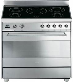 FREE Delivery & Removal as well as Price Matching! Best value is guaranteed when you buy the Freestanding Smeg Electric Oven/Stove C9IMXA from Appliances Online. Trusted by over 350,000 customers - Appliances Online, Legendary Service! Oven Cooktop. Included accessories: 41L Full width storage compartment below oven, Carcase cavity cooling fan, Safety automatic safety cutout, Satin stainless steel, fingerprint proof finish, Forced air cooling door, Digital clock, 8 Preprogrammed recipes, Residual heat safety flashing H for any zone above 60°C, 1 Rotisserie assembly, Non-stick tray, 2 20mm Baking trays, 1 Pair chrome tray handles, 5 Induction cooking zones, 10 Oven functions, Double glazed thermo reflective door, Low heat position on each zone - keeps food warm, 4 Cooking levels, 2 Free programmable slots, Manual or programmable cooking, 2 Chrome shelves, 5 Scrolling knobs for easy setting, Enamel grill-bake-roasting tray, Optional 60mm high rear splashguard supplied.