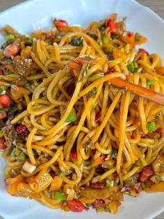 Savor the authentic taste of Nanchang mixed rice noodles—tender, chewy noodles tossed in a rich, savory sauce full of local tradition.